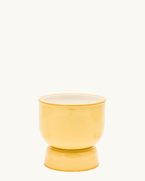 Yellow integrated ceramic pot and saucer set. Planter designed by Nueve Design Studio PH.