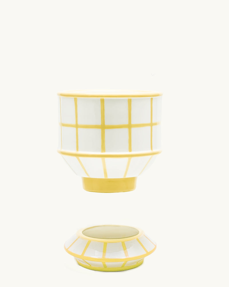 Checkered yellow integrated ceramic pot and saucer set. Planter designed by Nueve Design Studio PH.